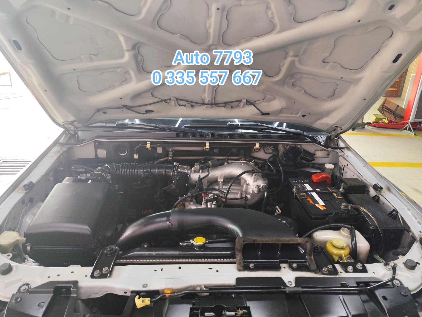 Khoang máy xe sau khi được vệ sinh tại Auto7793